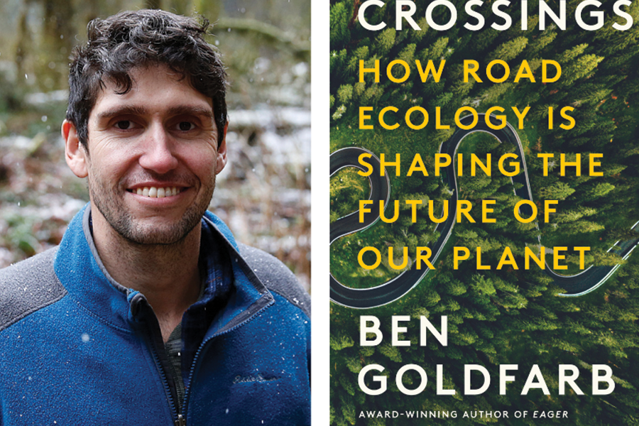 A photograph of Ben Goldfarb smiling next to the cover of his book, Crossings: How Road Ecology is Shaping the Future of Our Planet.